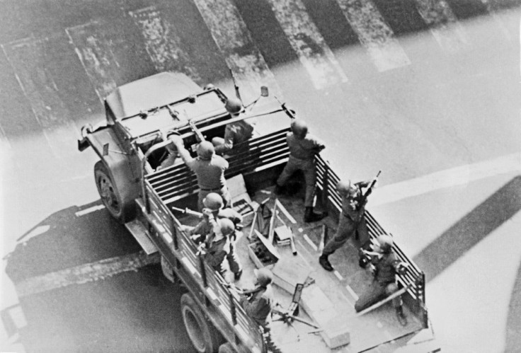 Chilean soldiers patrol the streets of the capital Santiago during the country's military coup in 1973