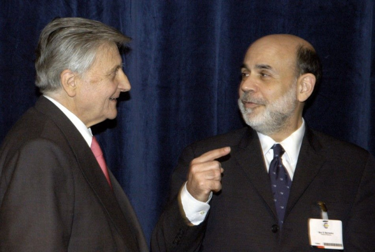 US Federal Reserve Chairman Bernanke and European Central Bank President Trichet talk before the European Central Bank&#039;s central Banking Conference in Frankfurt