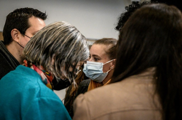 Valerie Bacot, with face mask, arriving at the courthouse in Chalon-sur-Saone, France, on Friday.