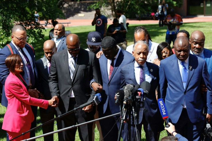 Members of the George Floyd family (from 4thL-R) George Floyd's brothers Philonise and Terrence, nephew Brandon Williams, Reverend Al Sharpton, civil rights lawyer and lead attorney for the George Floyd family Benjamin Crump, and Floyd's brother Rodney pr