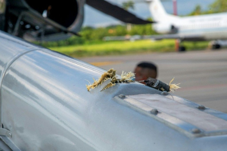 Handout picture released by the Colombian presidency showing damage to President Ivan Duque's helicopter at the Camilo Daza International Airport in Cucuta, Colombia on June 25, 2021