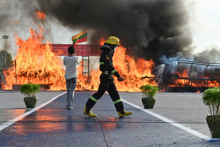 Sacks of green-brown cannabis were stacked high at a compound in the commercial capital Yangon