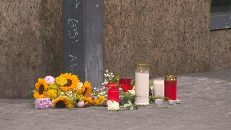 Flowers, candles at scene of deadly knife attack in Germany