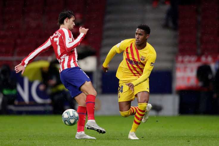 (L-R) Joao Felix of Atletico Madrid, Junior Firpo of FC Barcelona during the La Liga Santander match between Atletico Madrid v FC Barcelona at the Estadio Wanda Metropolitano