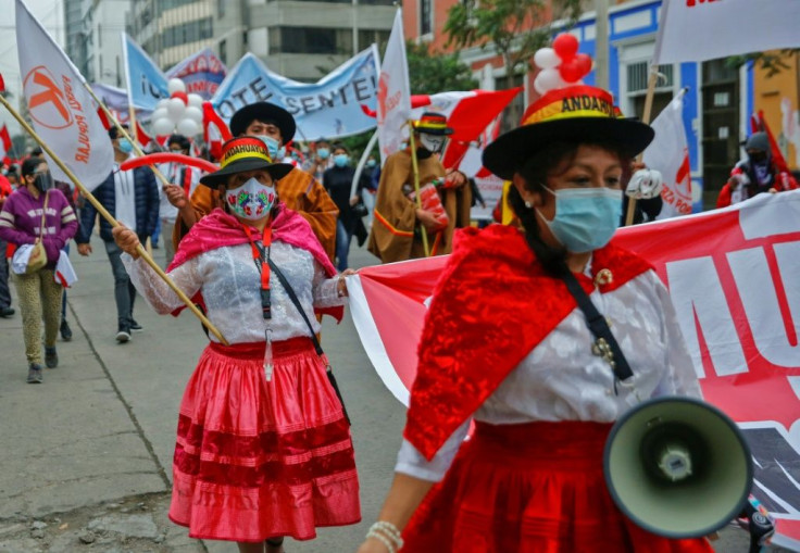 Indigenous women take part in a rally under the slogan #respectmyvote, opposing the possibility of a socialist government -in case leftist Pedro Castillo wins the June 6 runoff election