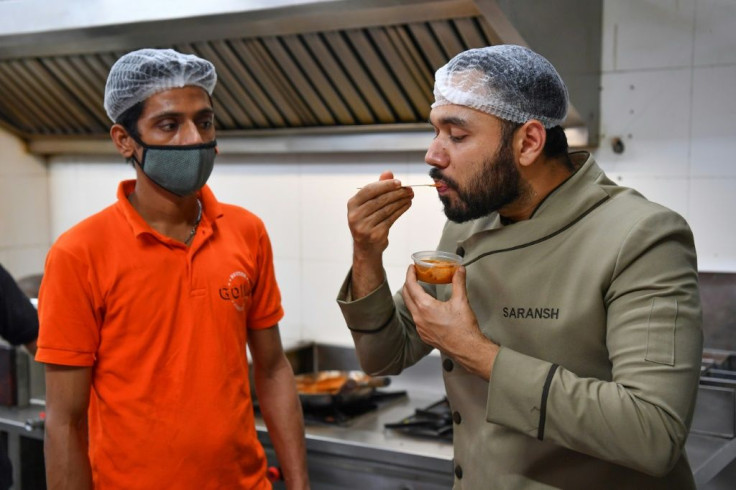 Indian celebrity chef Saransh Goila (R) has been called the maker of the world's 'best butter chicken' by MasterChef Australia