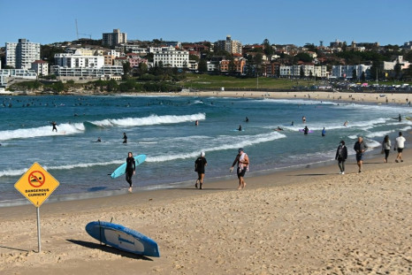 While the city centre was virtually deserted, large numbers of surfers and swimmers hit the water at Sydney's Bondi Beach