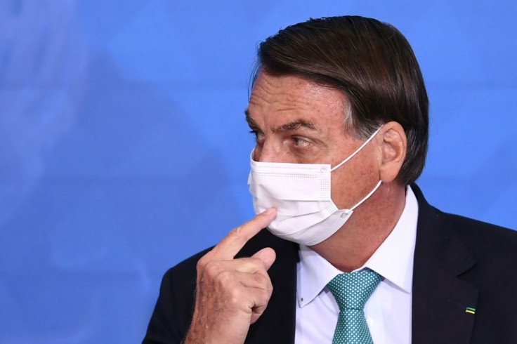This file photo shows  Brazilian President Jair Bolsonaro speaking during a June 21, 2021 event in Brasilia; he is facing a growing scandal over a questionable vaccine order