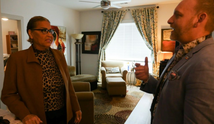 Dina Jacobs speaks with Chief Development Officer of the Montrose Center, Kennedy Loftin, during the opening the Law Harrington Senior Living Center in Houston, Texas