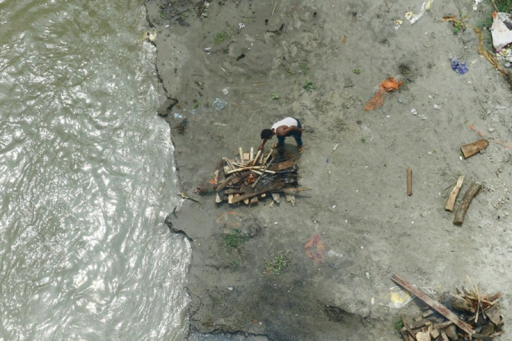 Officials in Allahabad say almost 150 bodies that floated up in the past three weeks have been cremated