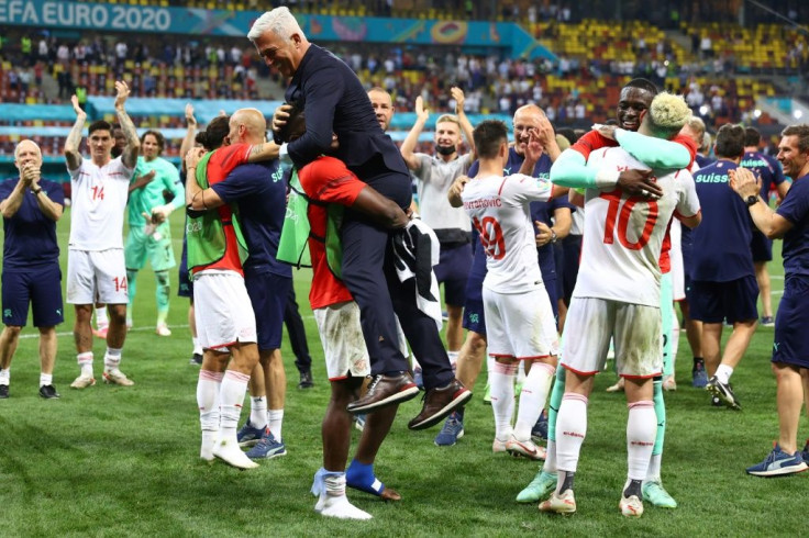 Switzerland players celebrate their win over France in Bucharest