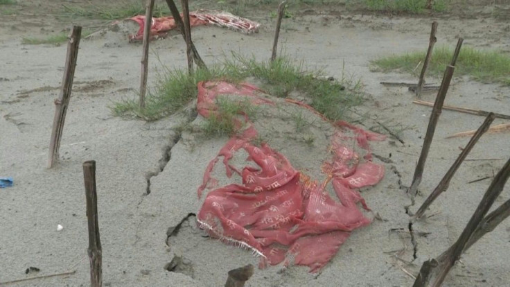 Shallow graves are emerging and bodies are floating down India's Ganges river as it swells with seasonal flooding