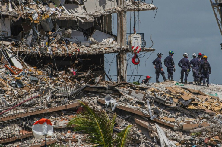 Experts are looking at possible pre-existing critical flaws in the structure of the apartment tower as rescue teams from Florida and abroad work around the clock to scour the debris for signs of life