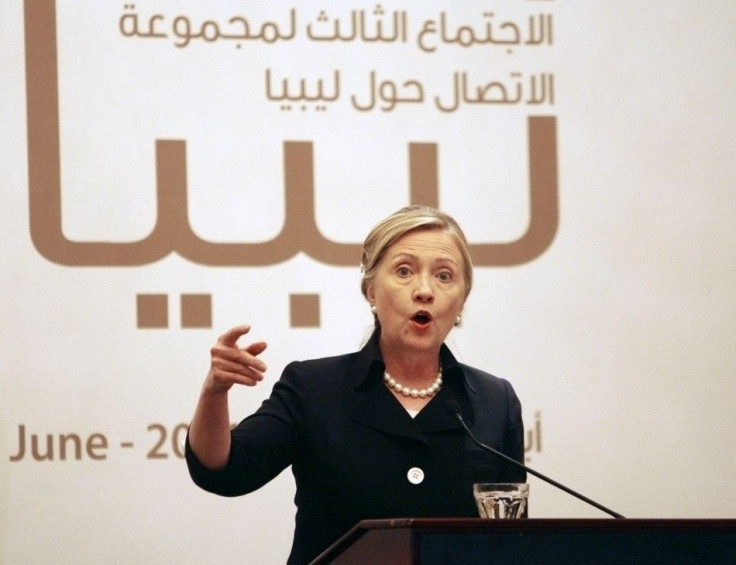 U.S. Secretary of State Hillary Clinton speaks during a news conference after the third contact group meeting on Libya, in Abu Dhabi