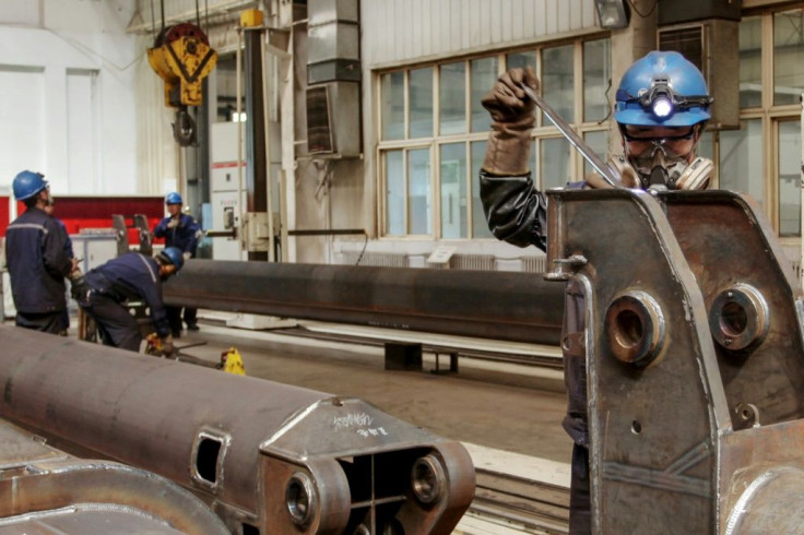 Data showed China's factory activity stabilised in June, with output hit by supply shortages of key commodities and microchips