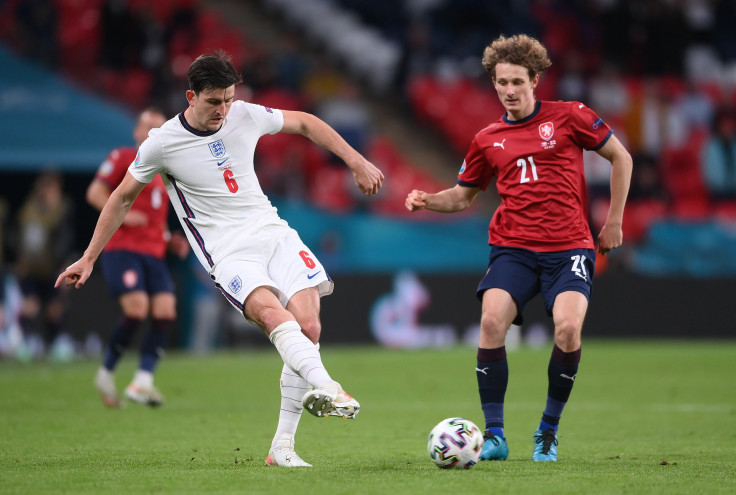 Harry Maguire of England makes a pass whilst under pressure from Alex Kral of Czech Republic