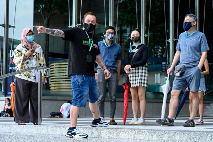 Ex-gang member Bruce Mathieu now helps lead the popular "Triad Trails" tour to fight stereotypes about ex-offenders in Singapore
