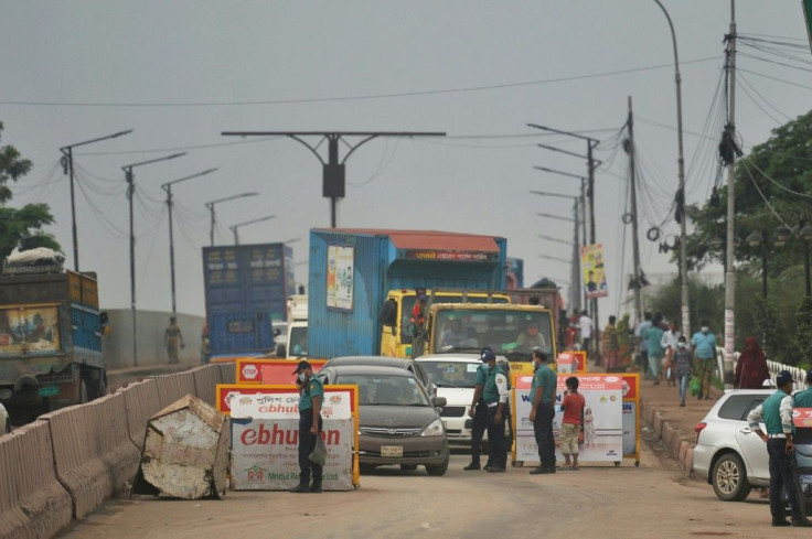 The streets of Bangladesh's capital Dhaka were deserted as soldiers patrolled and set up checkpoints