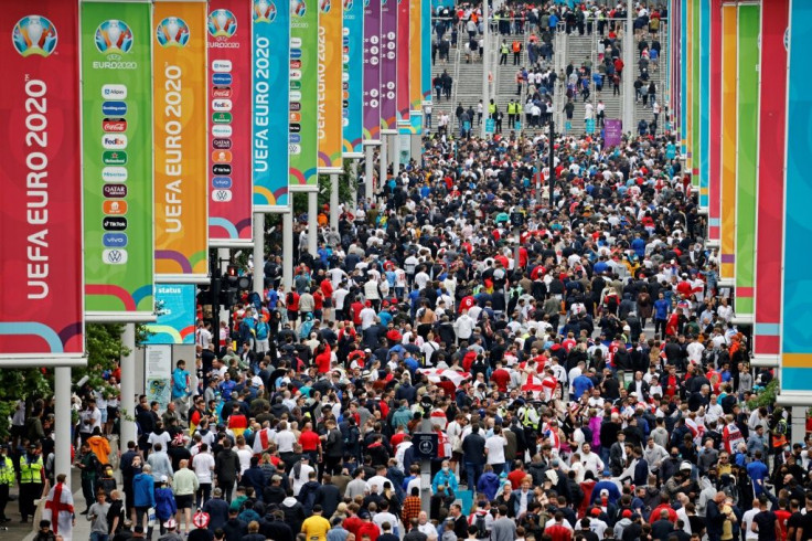 England supporters make their way up Olympic Way and into Wembley for the Germany game