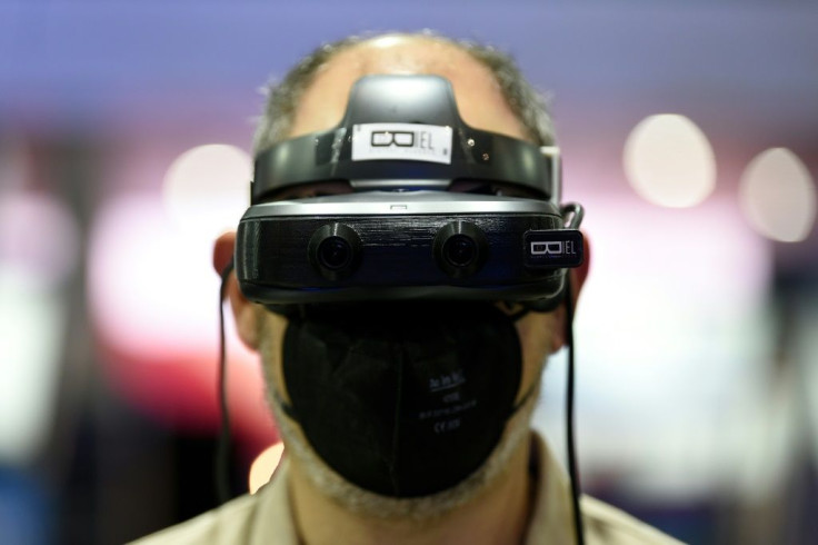 A man uses Biel digital glasses that help people with limited sight better perceive their surroundings