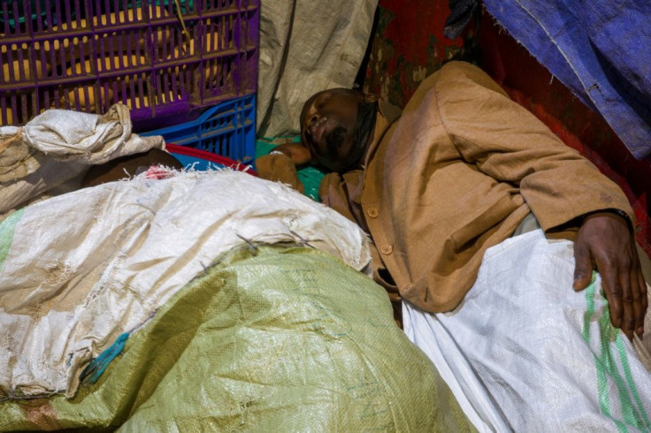 The less fortunate are forced to sleep in the open, curled up on sheets of cardboard or hessian sacks in a vain attempt to keep warm
