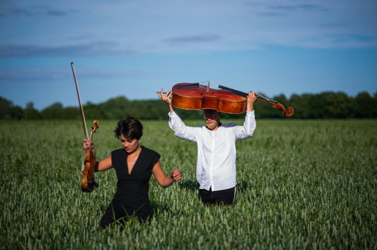 Playing in the open air in front of cows helps visiting artists relieve some of the stress of a performance, Jacob Shaw says
