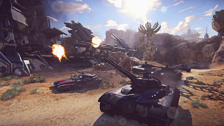 A tank column operated by multiple players assaulting a base in Planetside 2
