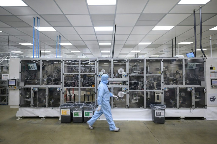 Employees work at the Envision battery manufacturing plant at Nissan's plant in Sunderland, north east England