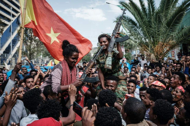 Women soldiers from the Tigray Defence Force celebrate as they return to Mekele