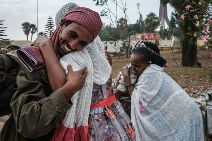 Women in the Tigrayan capital Mekele welcome the returning members of the Tigray Defence Force (TDF)