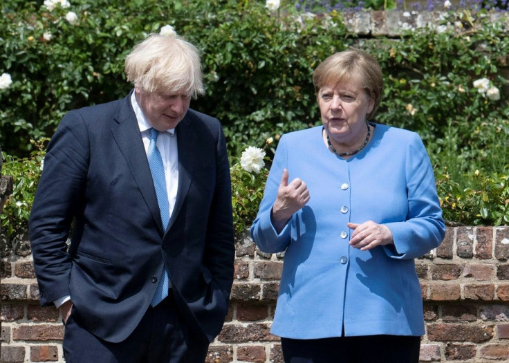 Britain's Prime Minister Boris Johnson announced a new academic medal in honour of German Chancellor Angela Merkel