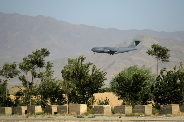 A US Air Force transport plane lands at the Bagram Air Base in Afghanistan on July 1, 2021, hours before a US official confirmed that all US and NATO troops had left the base