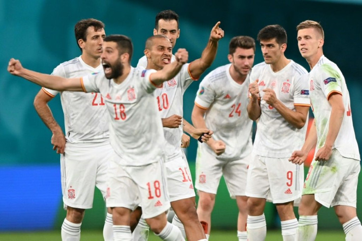 Spain players celebrate beating Switzerland on penalties in the Euro 2020 quarter-finals