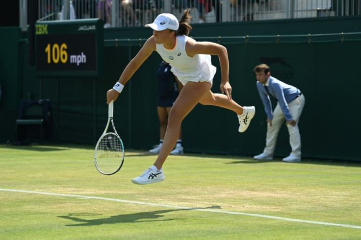 In a hurry: Poland's Iga Swiatek serves to Romania's Irina-Camelia Begu
