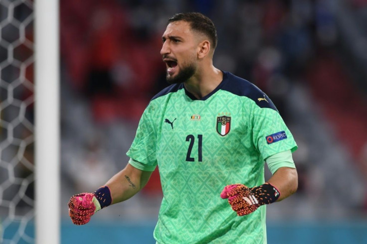 Gianluigi Donnarumma and Italy held on for a 2-1 win over Belgium in the quarter-finals