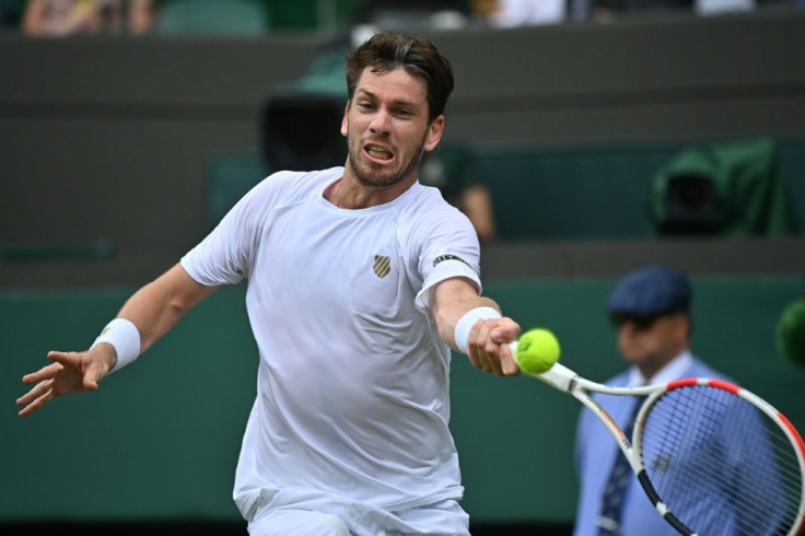 Britain's Cameron Norrie has played Federer in singles once before -- "He absolutely whacked me" (6-1, 6-1) -- and recalls the surreal atmosphere at the 2018 Hopman Cup