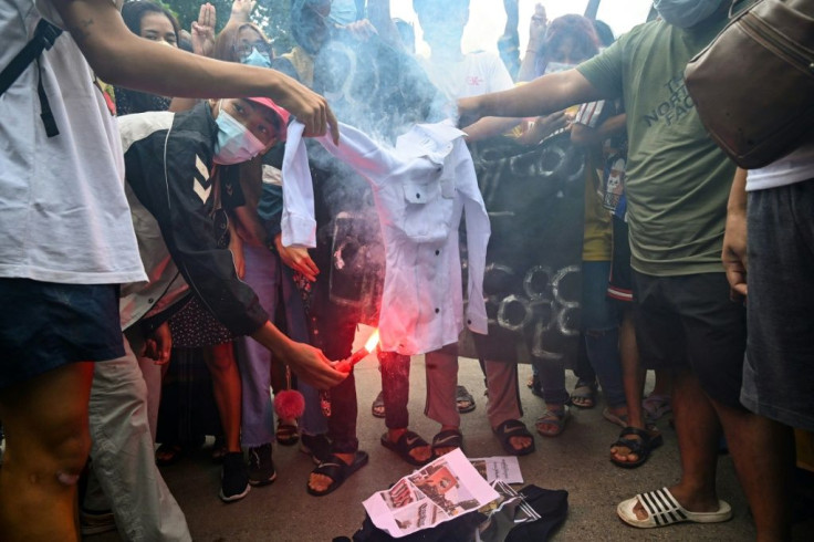 Protesters in coup-hit Myanmar have marked junta leader Min Aung Hlaing's birthday by burning his portrait and staging fake funerals