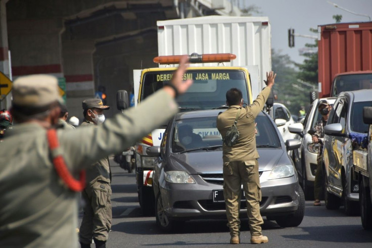 Authorities are turning back non-essential traffic flowing into Jakarta