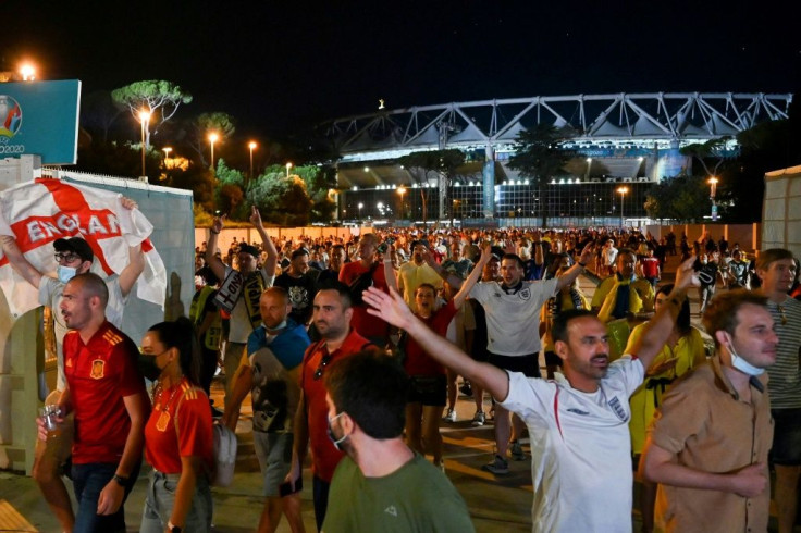 England fans celebrating on their way out of the Stadio Olimpico in Rome