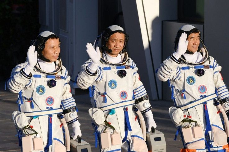 Nie Haisheng (centre), Liu Boming (right) and Tang Hongbo (left) blasted off in June