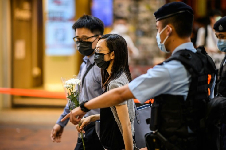 Hong Kong police have warned residents against mourning a man who killed himself after stabbing an officer