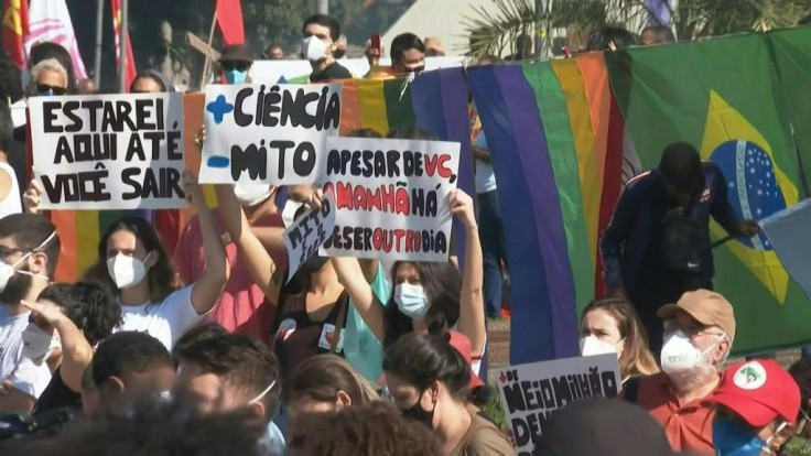 IMAGES Brazilians protest against President Jair Bolsonaro in Rio de Janiero over his management of the Covid-19 pandemic, which has left over half a million dead in the country.