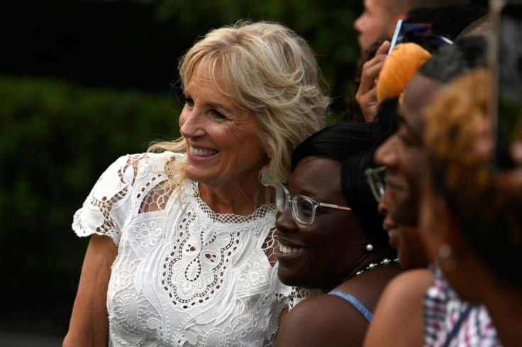 US First Lady Jill Biden poses with guests after US President Joe Biden delivered a speech on Independence Day