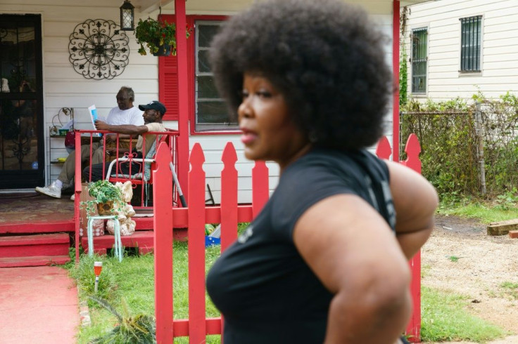 Sheila Tyson and her team go door-to-door in a poor neighborhood of Birmingham, Alabama, to urge people to get vaccinated