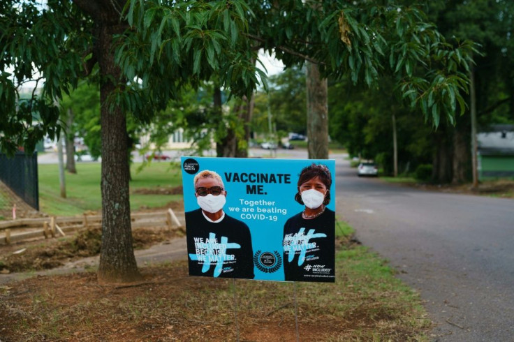 A sign urging people to get Covid-19 vaccines in Memorial Park, a poor neighborhood of Birmingham, Alabama