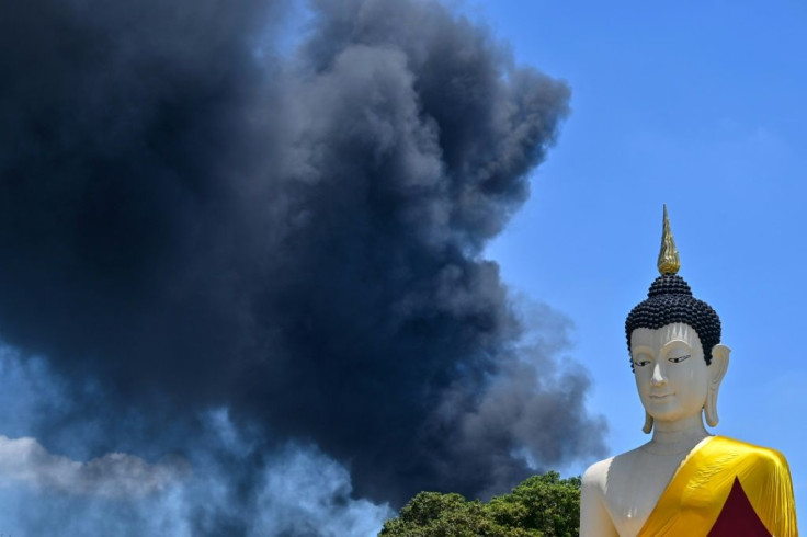 Heavy plumes of smoke could be seen in Bangkok's downtown from an explosion 35 kilometres away near the city's airport