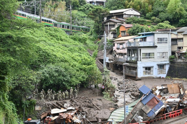 Pylons were toppled, vehicles buried and buildings tipped from their foundations in the landslide