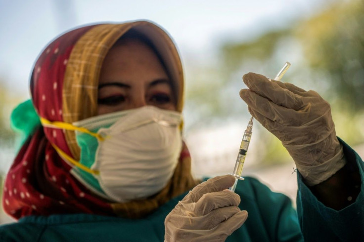 So far, only about five percent of Indonesia's nearly 270 million people has received two jabs
