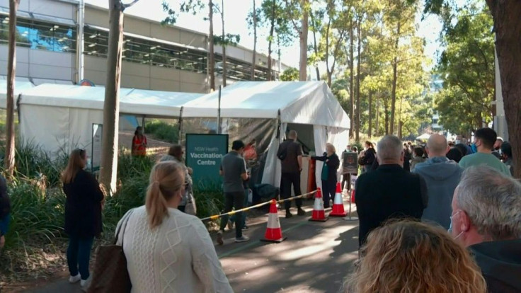 Images from outside a Covid-19 vaccination hub in Sydney as a citywide lockdown is extended. More than five million Sydney residents will spend at least another week in coronavirus lockdown.