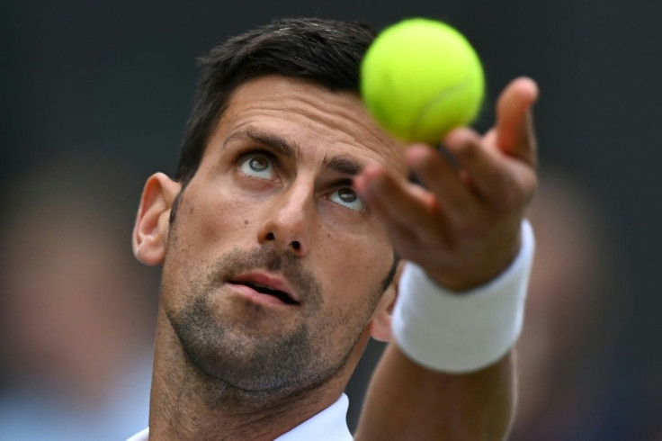 Eyes have it: Novak Djokovic serves to Hungary's Marton Fucsovics
